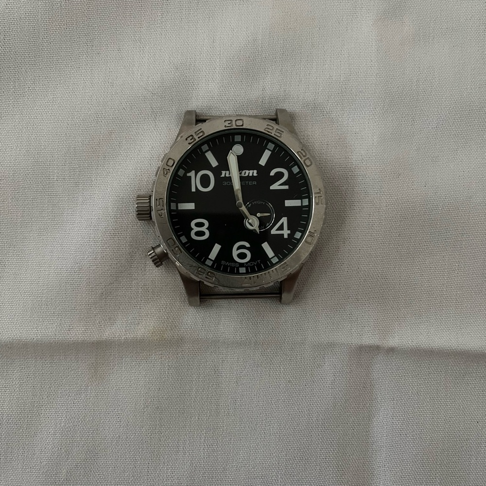 Nixon Silver and Black Dial Watch